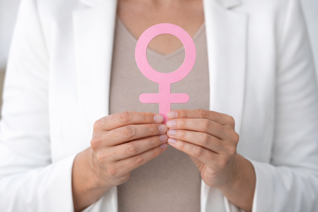 hande halten venus symbol aus pink